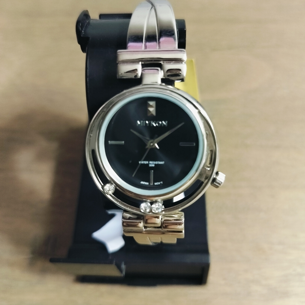 Woman's Silver Watch With moving stones